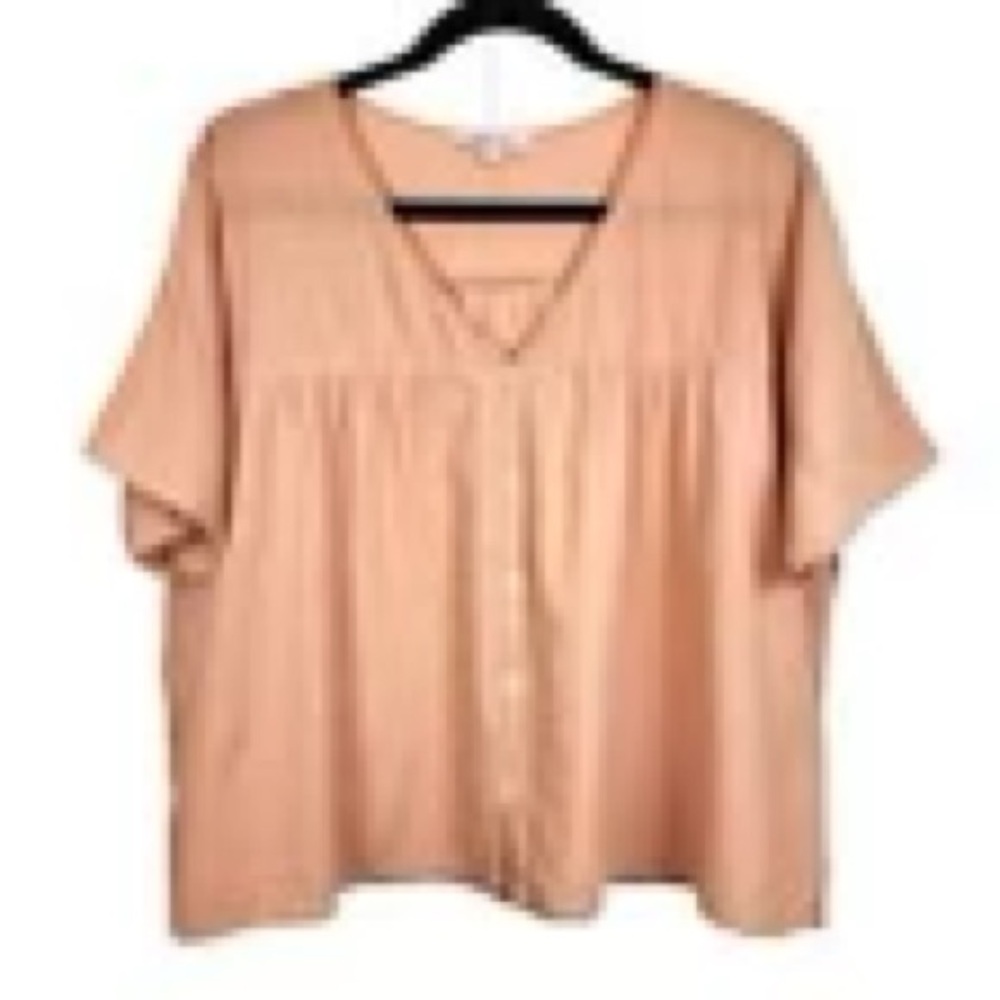 Madewell Swiss dot blouse 
Size Large